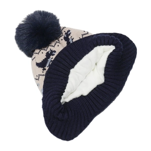 Détail du bonnet dinosaure pour enfant avec doublure en polaire blanche ultra chaude
