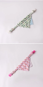 Detail of pet bandanas with green cactus and purple carrot patterns and D-rings