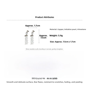 Detailed view of pearl tassel earrings with rhinestones showing 7.5cm length and materials