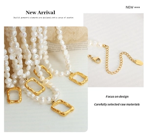 Detail of gold hammered rectangle pendant and baroque pearl on stainless steel chain