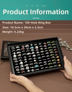 Detail view of 100-slot ring display box, size 18.5x29x3.5cm, with black velvet interior
