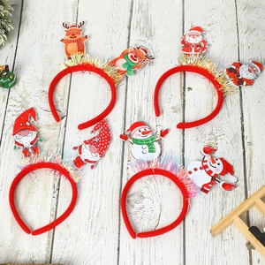 Christmas headband set featuring Santa, Snowman, Reindeer, and Gnome on wooden background