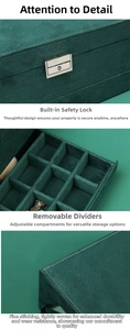 Macro view of velvet jewelry box with secure metal lock and adjustable inner dividers