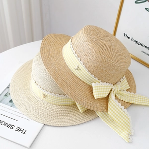 Flat top straw boater hats with yellow checkered ribbon and delicate lace trim for women