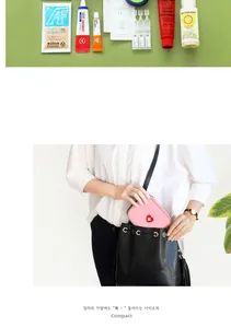 Pink heart-patch travel medical pouch shown with various ointment tubes and health sprays