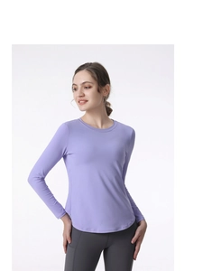 Detail of light purple yoga top with curved hem and breathable mesh athletic fabric