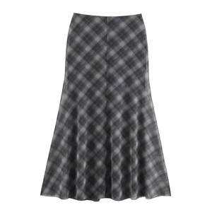 Detail of grey plaid midi skirt featuring lightweight fabric and classic A-line silhouette