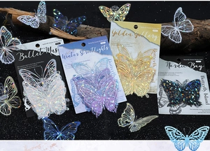 Detail of holographic butterfly stickers on black background with wooden branch decor