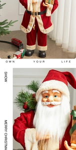 Close-up of Santa Claus doll in red velvet outfit holding a gold gift box with green ribbon