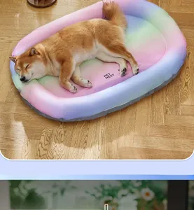 Close-up of a Shiba Inu resting on a rainbow gradient cooling pet mat with neck support