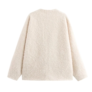 Back view of beige sherpa cardigan showing textured fabric and central vertical seam