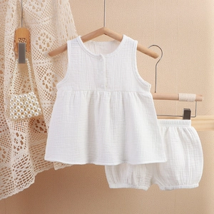 Baby girl white cotton gauze pajama set with sleeveless top and matching bloomer shorts