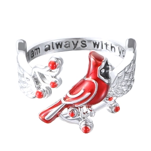 Detail of red cardinal ring with I am always with you engraving on inner band