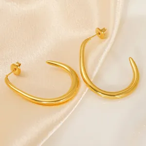 Minimalist gold U-shaped earrings in polished stainless steel for a modern look