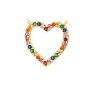 Macro shot of a heart-shaped gold pendant encrusted with vibrant colorful round gemstones
