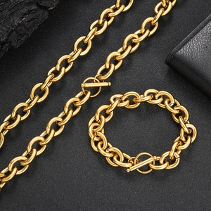 Detail of 12mm golden stainless steel Rolo chain set with OT toggle clasp and matching bracelet