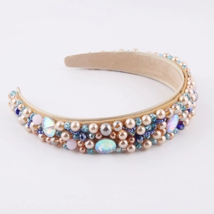 Baroque padded headband with iridescent crystals and champagne pearls on beige velvet base