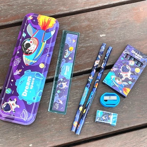 Space astronaut theme stationery set including pencil case, ruler, pencils, and erasers.