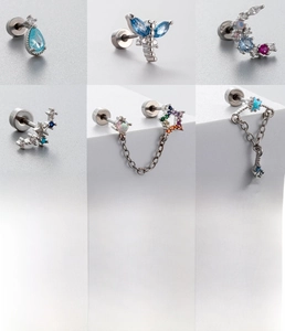 Macro detail of titanium steel dragonfly and star studs with 0.8x6mm bar size