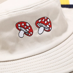 Beige cotton bucket hat for women with cute red mushroom embroidery for sun protection