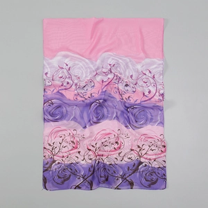 Detail of pink and purple chiffon scarf with floral rose print and sheer texture