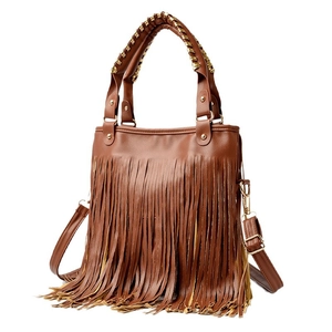 Brown PU leather tote bag with fringe tassels and gold chain handles on white background