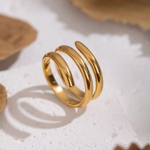 Minimalist gold spiral geometric ring with a three-layer polished stainless steel design