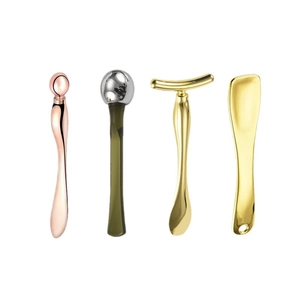 Zinc alloy 4-piece eye cream massage tool set with rose gold, silver and gold finishes