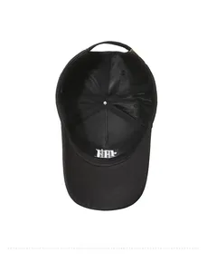 Detail view of cotton baseball cap interior with reinforced seams and adjustable metal buckle
