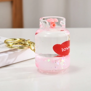 Pink heart quicksand gas bottle keychain with love heart and liquid inside