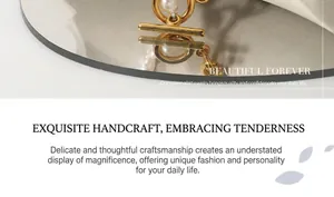 Detail of a gold OT toggle clasp paired with a white freshwater pearl on a Cuban chain