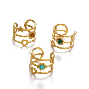 Three bohemian celestial gold rings with tiger eye, malachite, and turquoise natural stones