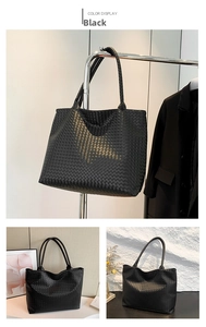 Detail view of black woven faux leather tote bag showing large capacity and fine texture