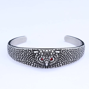 Nordic owl cuff bracelet in vintage silver stainless steel with red rhinestone eyes