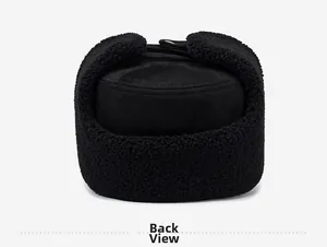 Back view of black winter trapper hat with warm ear flaps and thermal fleece lining