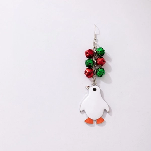 Detail of Christmas penguin earring featuring colorful bells and enamel finish