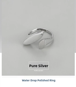 Detail view of adjustable S925 sterling silver ring with smooth teardrop design