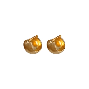 Golden metal hoop earrings with round ball charms and elegant matte finish