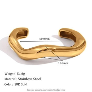Irregular liquid wave open bangle in 18K gold plated stainless steel with mirror finish