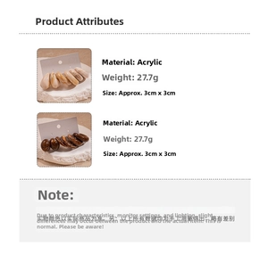 Detailed view of acrylic earrings set with cream and brown textures showing size and weight