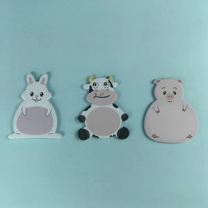 Cute animal shaped sticky notes featuring rabbit cow and pig designs on blue background