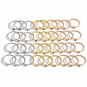 Minimalist twisted 18K gold plated stainless steel rings with colorful zircon birthstones