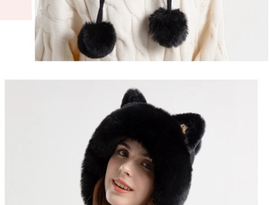 Detail view of black faux fur winter hat with cute cat ears and soft plush pom-poms