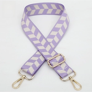 Close-up of No. 161 jacquard replacement bag strap with purple V-pattern and gold hardware
