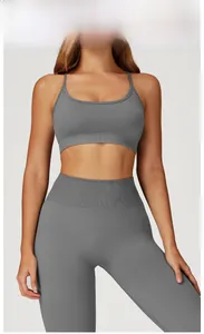 Detailed texture of seamless dark grey yoga bra and high waist leggings set for women