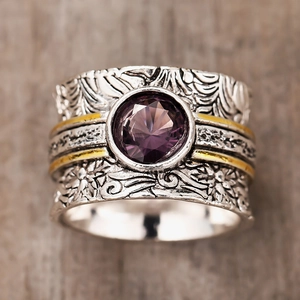 Vintage engraved silver spinner ring with purple gemstone and gold accents