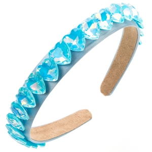 Close-up of light blue heart-shaped crystals on a satin headband with non-slip lining