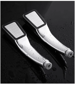 Detail view of square high-pressure shower head with 300 holes in chrome and black finish