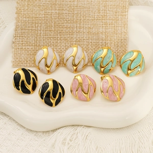 Irregular vintage enamel stud earrings in white, green, black and pink with gold edges