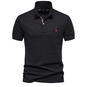 Close-up of deer embroidery and pique fabric on a black cotton polo shirt for men